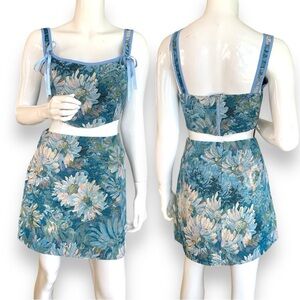 BLUE FLORAL 2 PIECE CROP TOP & MINI SKIRT. WOMEN’S SZ LARGE  NEW WITH TAGS